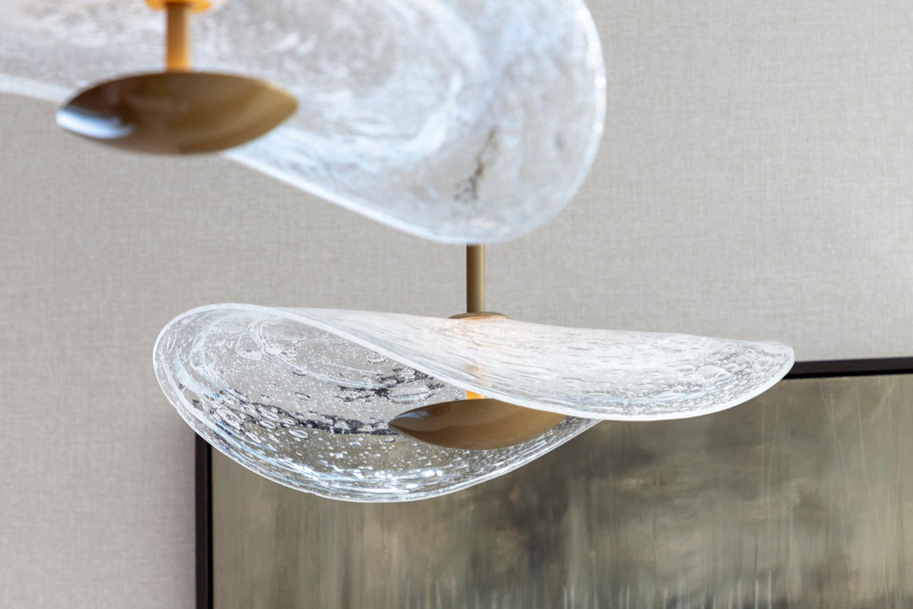 Bespoke lighting in luxury Kensington apartment by Nineteen Interiors.