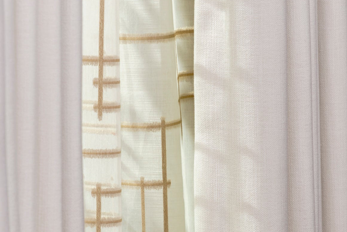 Close-up of handmade textured curtains and voiles to Kensington luxury master bedroom. Fabrics selected by Nineteen Interiors.